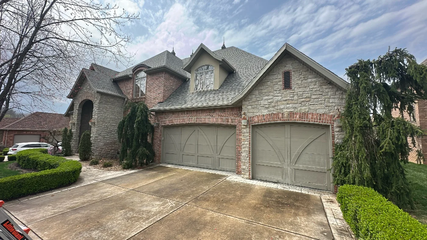 Completed asphalt shingle roof after replacement and cleanup